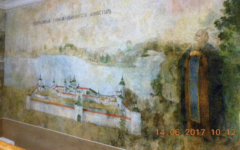 Painting of man and buildings