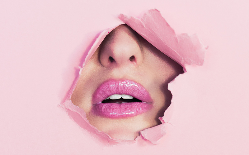 Face with pink lipstick
